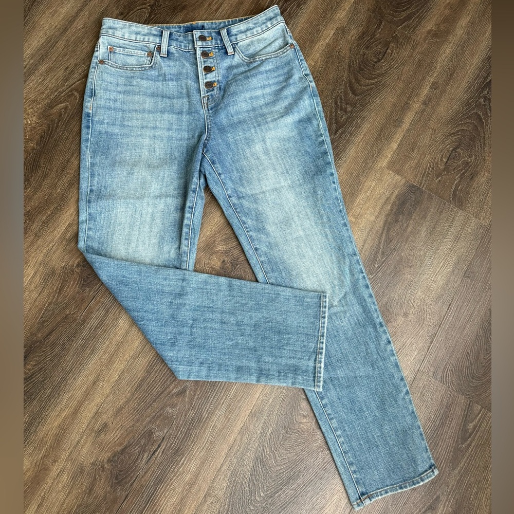 New! timeless high-rise silhouette detailed with a clean button fly.